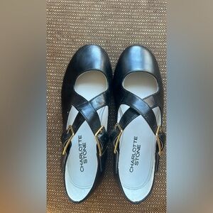 Brand new Charlotte Stone size 36  Black Flats/ Mary Janes with Gold Buckles
